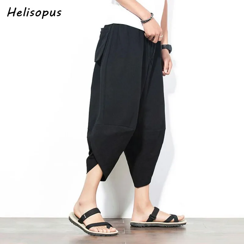 

Helisopus Men Calf Length Loose Pants Pockets Wide Leg Baggy Crotch Elastic Waist Harem Pants Asian Plus size