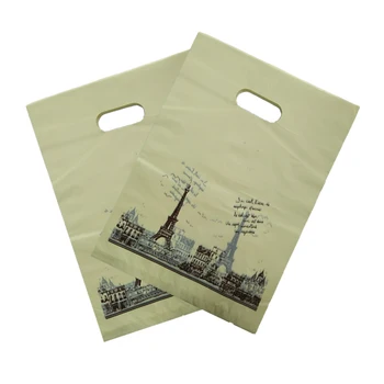 

50pcs/lot 25x35cm Tower Design Yellow Plastic Shopping Bags Boutique Gifts Cosmetics Packaging Bags Favor Plastic Gift Bag