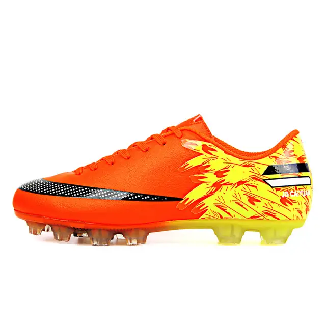 kids orange football cleats