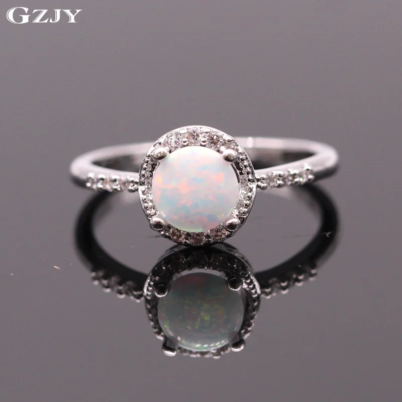 Prix pour Belle Mignon Simple Ronde Bijoux Blanc Opale de Feu Anneau De Mariage Or Blanc Plaqué Anneau Pour Les Femmes De Mariée de Fiançailles Bague Prix pour Belle Mignon Simple Ronde Bijoux Blanc Opale de Feu Anneau De Mariage Or Blanc Plaqué Anneau Pour Les Femmes De Mariée de Fiançailles Bague