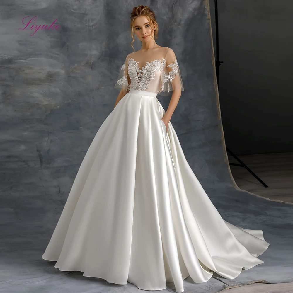 

Liyuke 2019 Married A-line Wedding Dress Lace Appliques Scoop Neck Flare Sleeves Back Illusion Stain Customized Floor-length