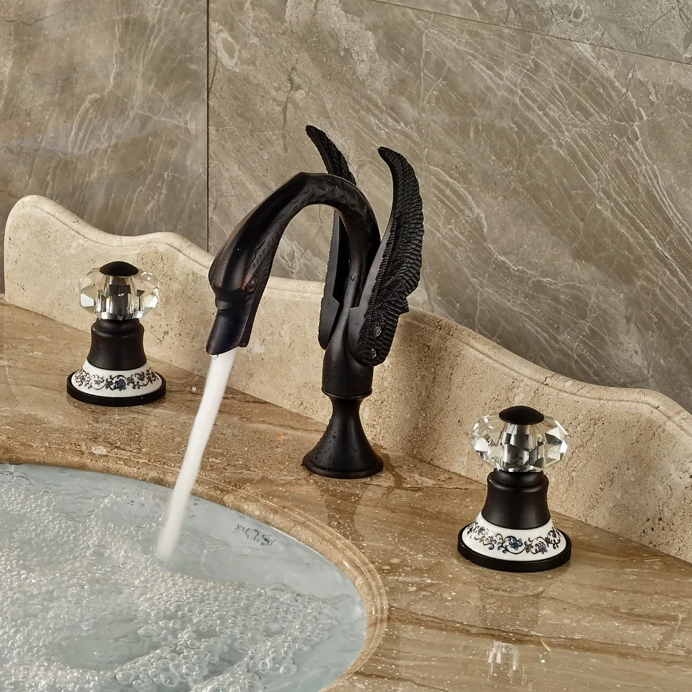 

Oil Rubbed Bronze Double Crystal Handles Mixer Tap With Blue And White Porcelain Pedestal