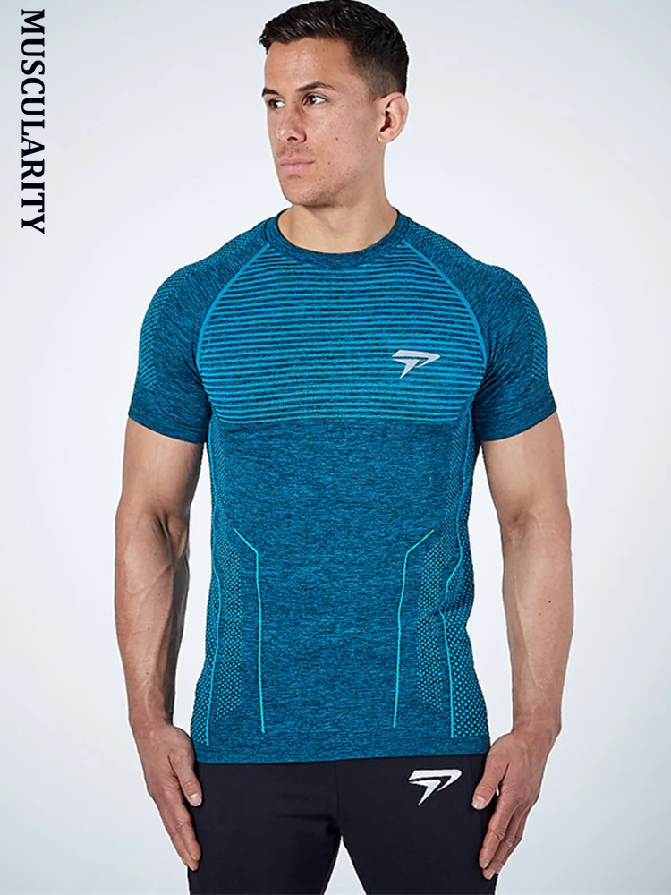 Tanie Muskulaturę mężczyźni Pro szybkie pranie trening siłownie długie Top Tee sportowych działa Yogaing kompresji Fitness ćwiczenia koszulki odzież