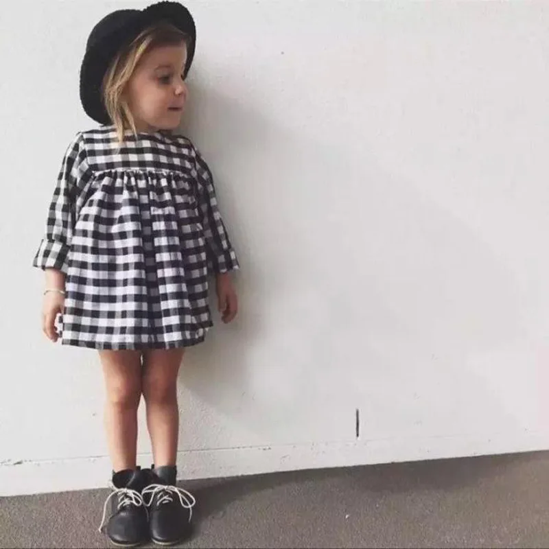 boy dressed as baby girl