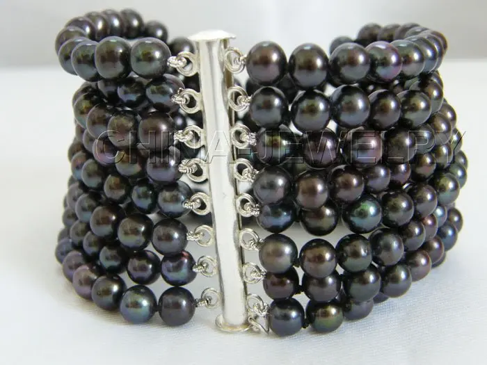 

AAAA8"8row7mmNatural black perfect round pearl bracelet