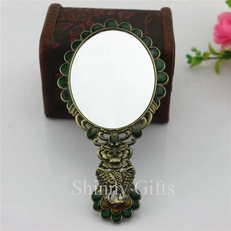 Peacock mirror with hand (7)