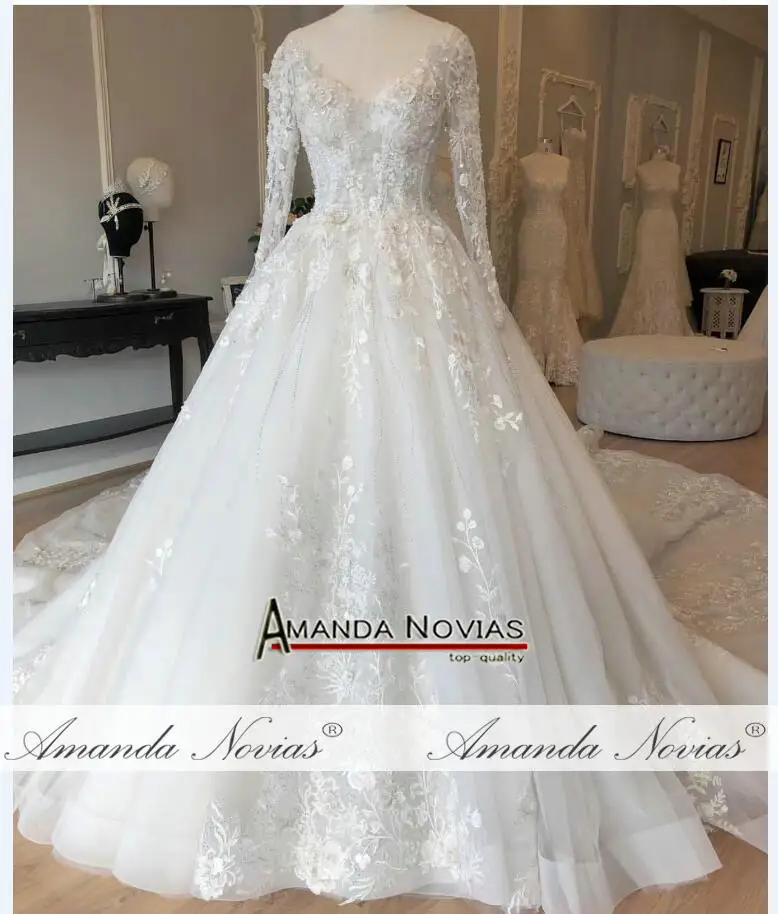 Элегантное кружевное свадебное платье с длинными рукавами, дизайн