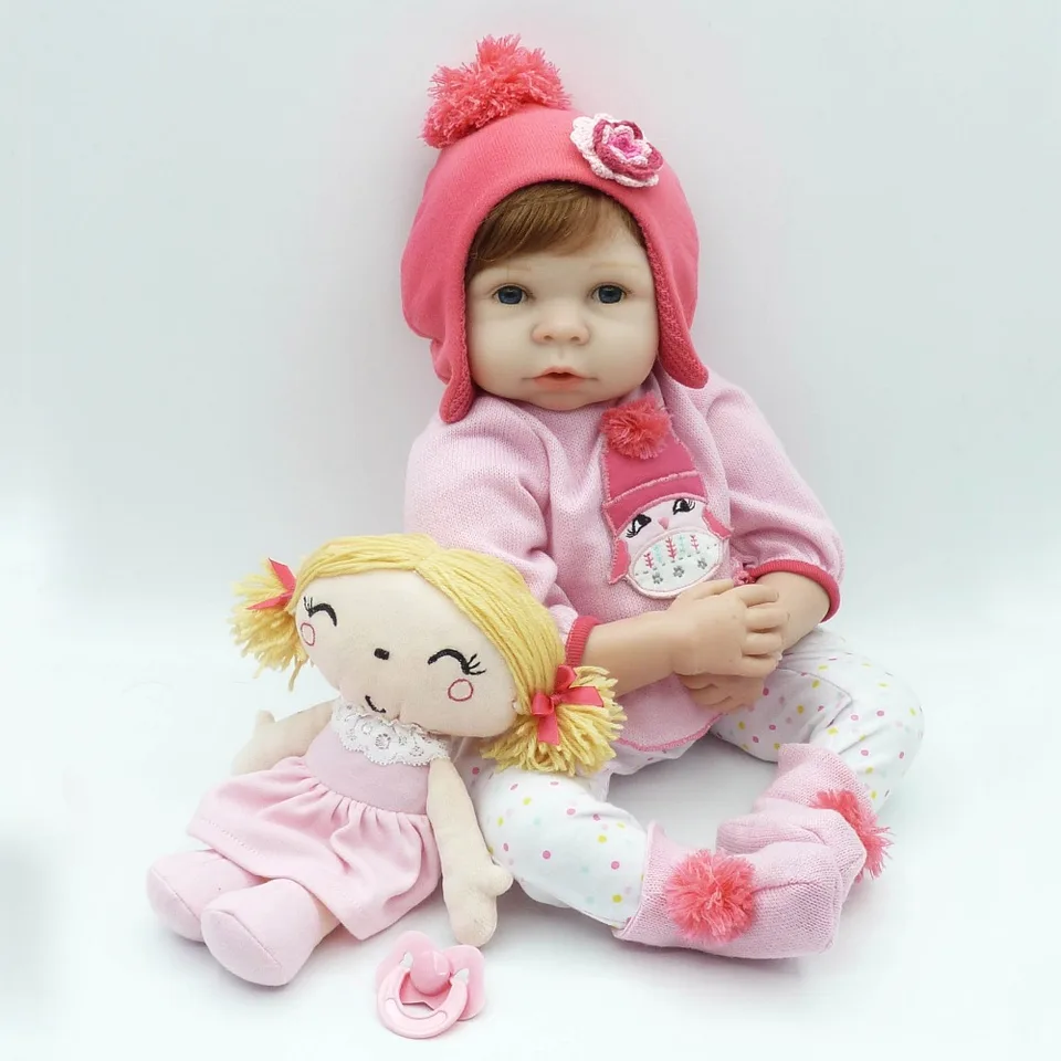 soft doll with magnetic pacifier