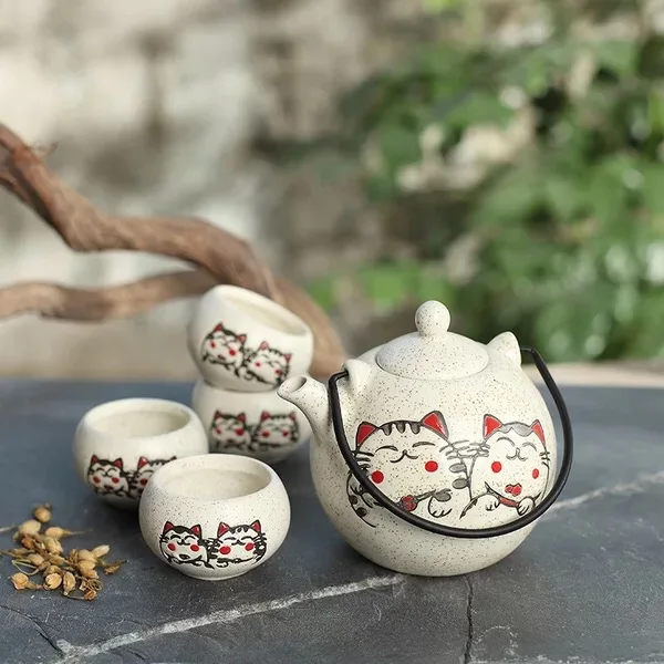 

Japanese and Fengkungfu Tea Set Retro Mini-luxury Cat Ball Pot Flower Teapot One Pot Four Cups Gift Set