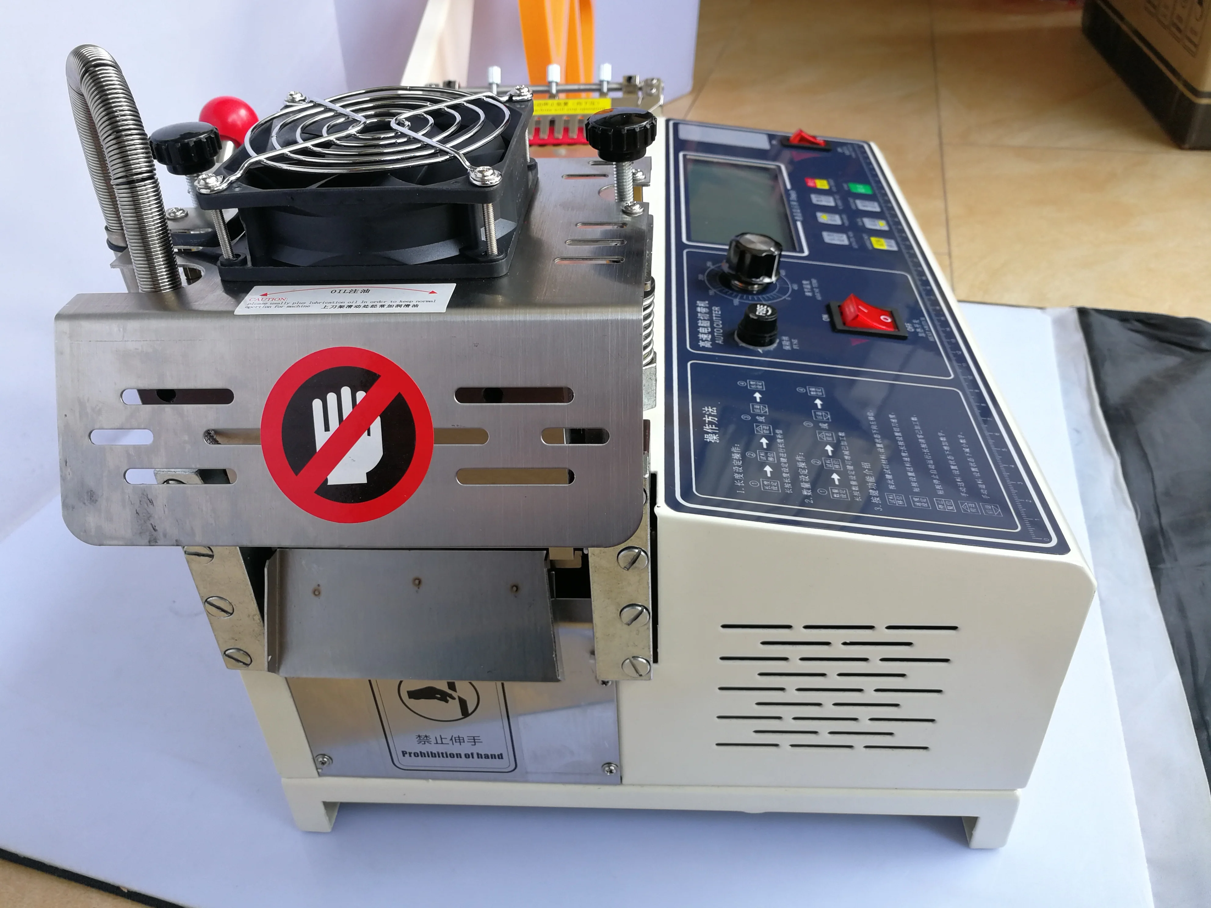 988T large screen display computer automatic hot and cold Cloth belt cutting machine, magic adhesive tape zipper webbing machine 988T large screen display computer automatic hot and cold Cloth belt cutting machine, magic adhesive tape zipper webbing machine