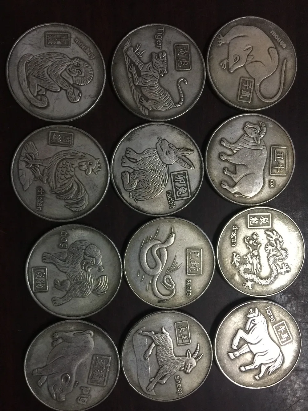 

The 12 Chinese zodiac Coin any of the twelve animals