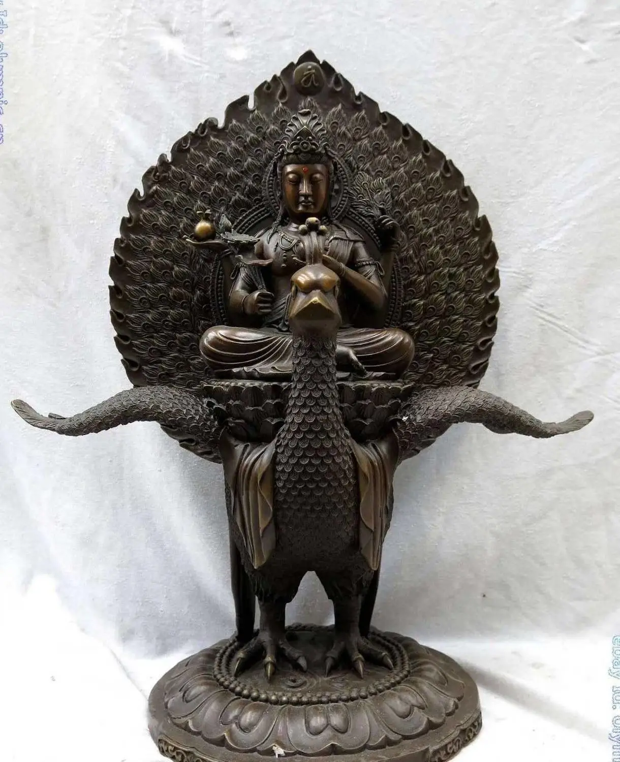 

19" China purple bronze fine workmanship four arm Kwan-yin buddha on roc Statue