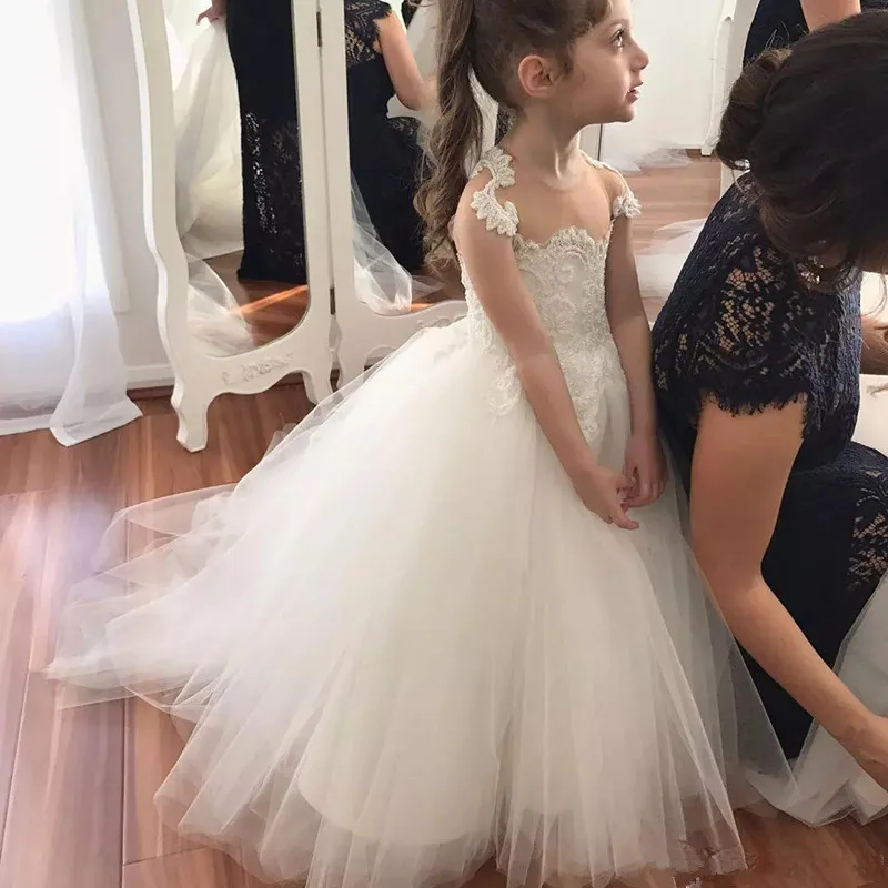 cute-white-sheer-neck-flower-girls-dresses-for-wedding-lace-appliqued-princess-girls-pageant-dresses-sleevess-floor-length-wears-for-girl.webp (2)_