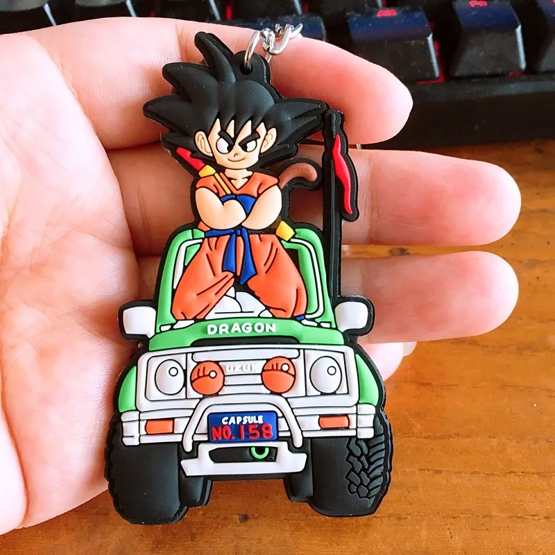 

Japanese anime Dragon Ball PVC keychain Son Goku drives car motorcycle funny novelty pendant Keyring Jewelry Chaveiros Llaveros