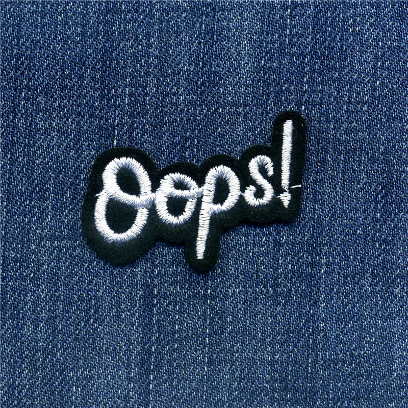 

The Black White Oops! Patches Iron On Or Sew Fabric Sticker For Clothes Badge Patch Embroidered Appliques DIY