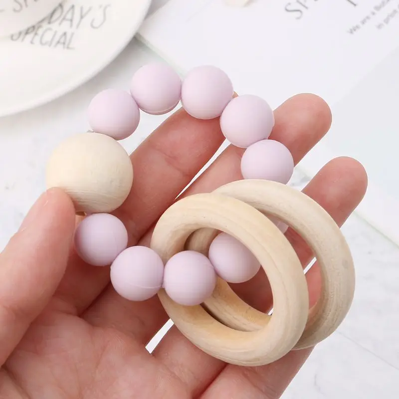 

2pcs Baby Teether Bracelet Toys Chew Bite Silicone Wood Rings Teeth Beads