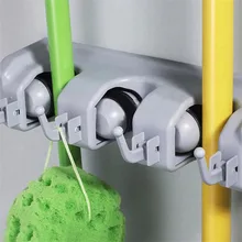 Hot Selling Plastic Kitchen Wall Mounted Hanger 4 Position Kitchen Storage Mop Broom Holder Tool