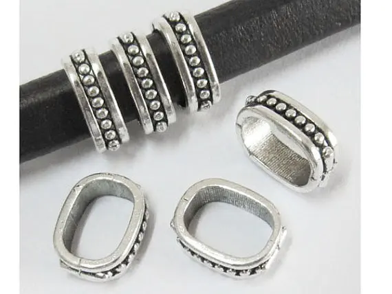 

Licorice Thin Spacer 10x6mm Stitched Beads Stripe Licorice Findings