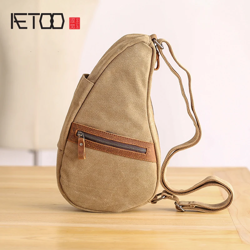 

BJYL Personality Chest Bag male canvas bag casual single shoulder horn bag fashion casual dumpling type retro bag
