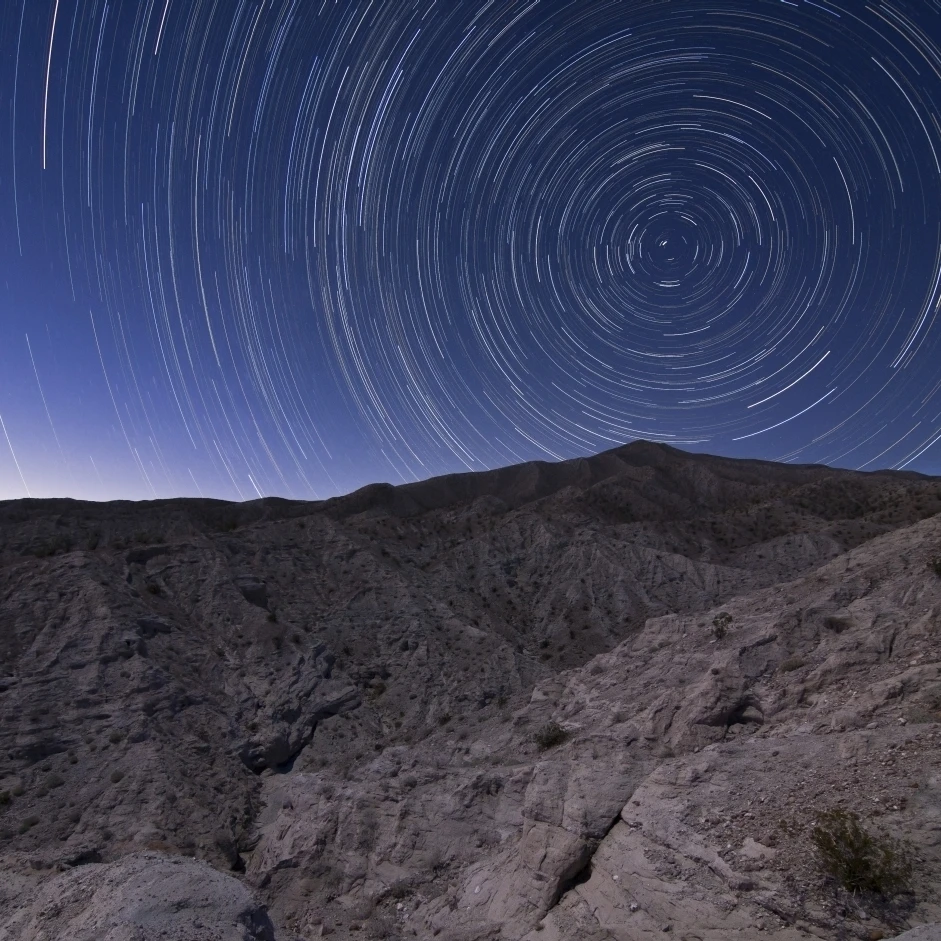 Star trails above Coachwhip Canyon in Anza Borrego Desert State Park  California Poster Print (28 x 27)