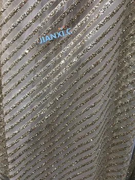 

top sale JIANXI.C-1106 french net embroidered lace fabric for party dress in gold with glued glitter