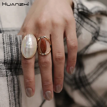 

HUANZHI New Oval Personality Geometric Pearls Shell Rings Metal Alloy Finger Rings Sets For Women Party Travel Jewelry Gifts