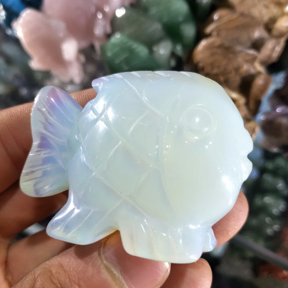 

Natural opal hand-carved fish is suitable for home decoration