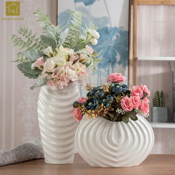 

Ceramic Shell Vase Porcelaine De Chine Tabletop Vase For Home Wedding Decoration Vase En Verre Ceramic Modern Vase Decor QAB101