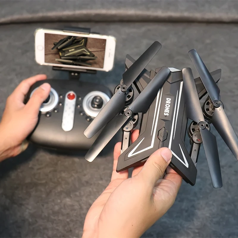 

Free shipping Rc airplanes KY601 2.4GHz Foldable 4-Axis 0.3MP HD Camera WiFi Altitude Hold Hover Remote RC Quadcopter Drone UAV
