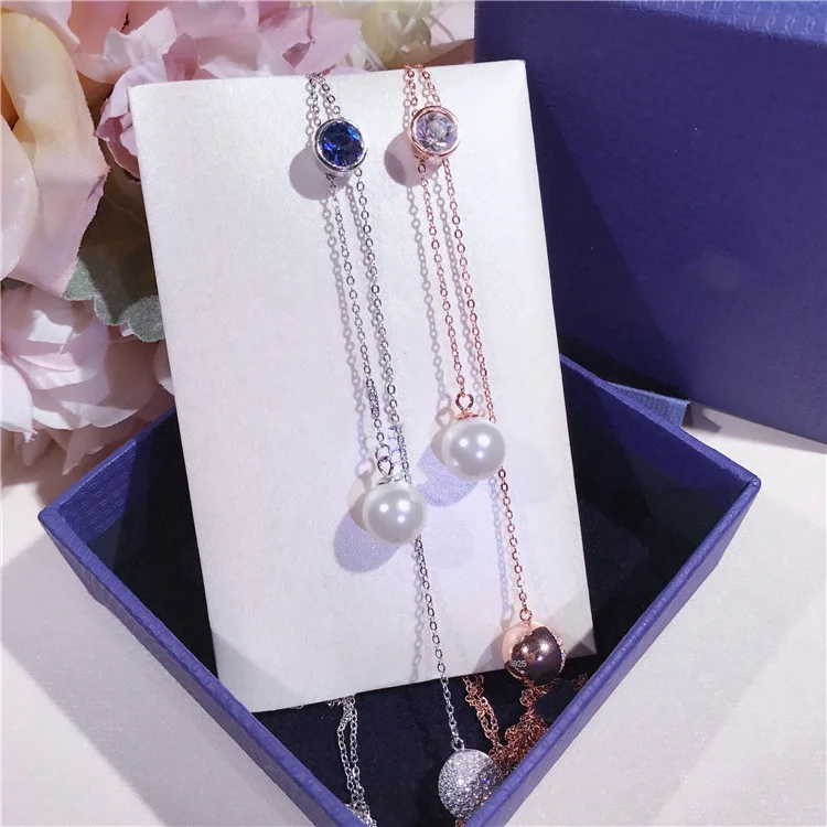 

S925 Sterling Silver Micro - Set Fritillary Pearl Blue Crystal Tassel Slip Buckle Stretch Sweater Chain for Women