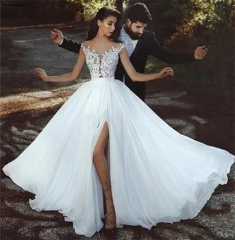 

2019 Gorgeous Beach Wedding Dresses Sheer O-Neck Cap Sleeves Lace Appliques Arabic Bridal Gown With Slit Customized robe mariage