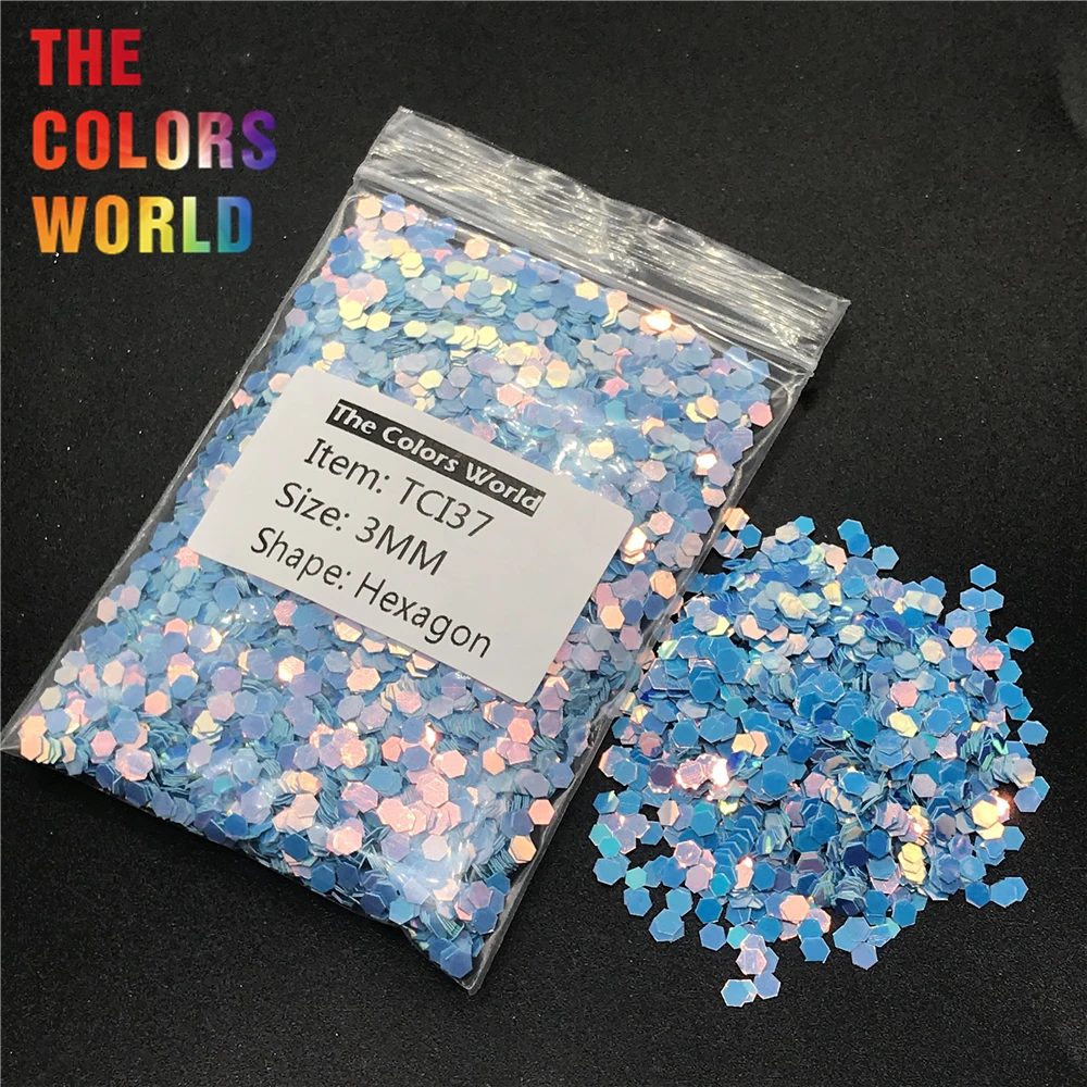

TCI37 Pearlescent Iridescent Blue Color With Gold Light Hexagon Shape Nail Glitter Nail Art Design Face Glitter Cup Decoration