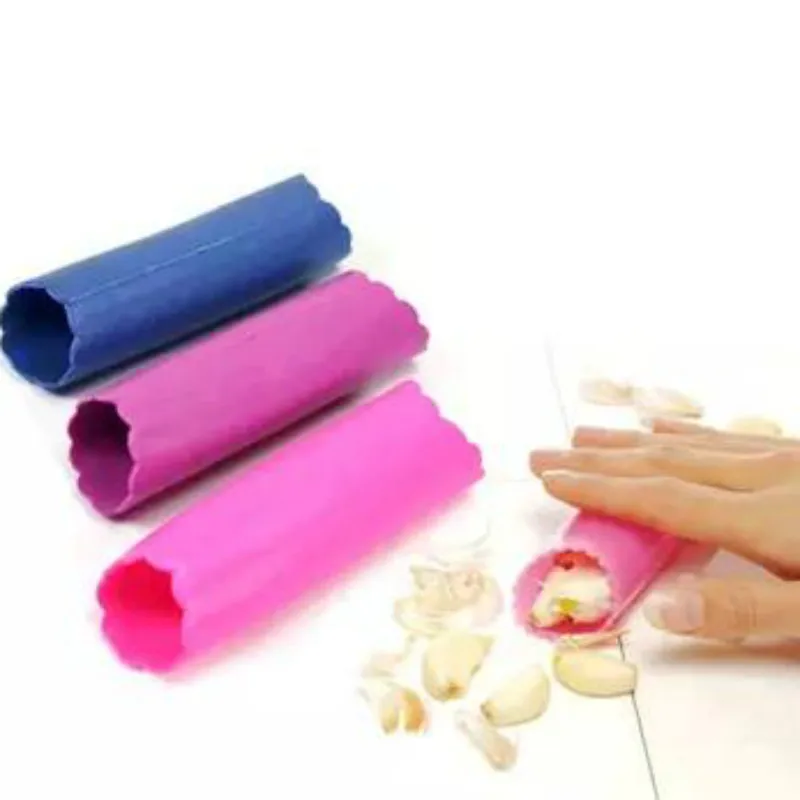 

Magic Garlic Presser Crusher Peeler Fruit Vegetable cooking Tools Kitchen Gadget Accessories GIFTS wholesale