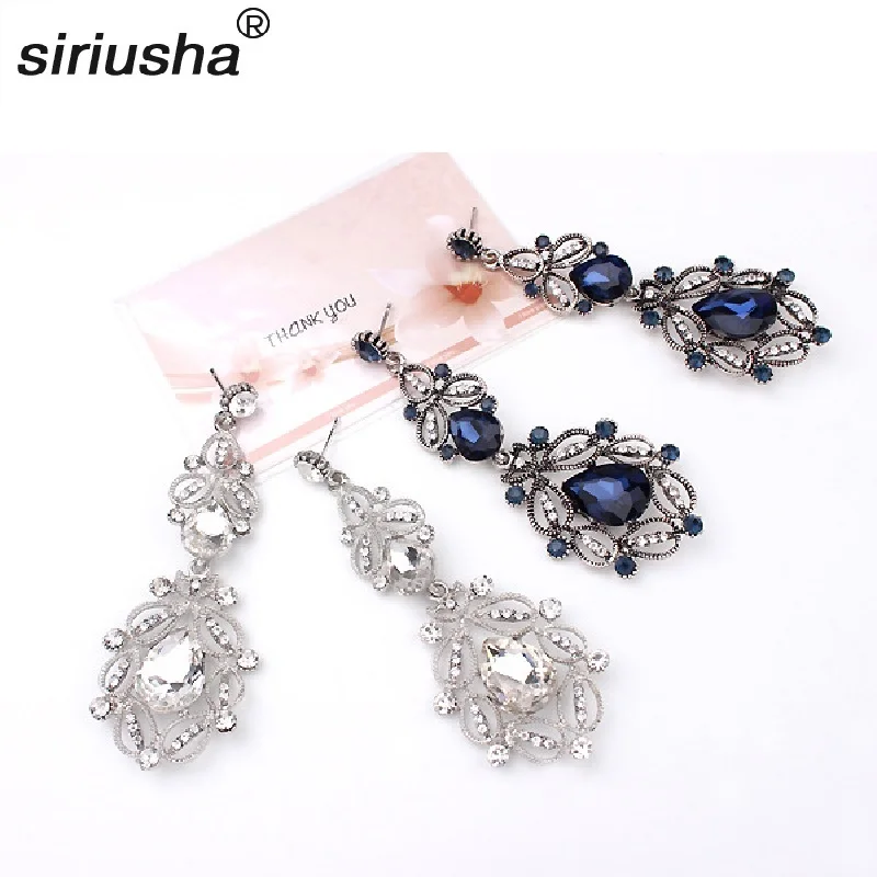 

Hot European and American fashion exaggerated earrings Metal luxury zircon drop shape temperament glass ear jewelry Y913