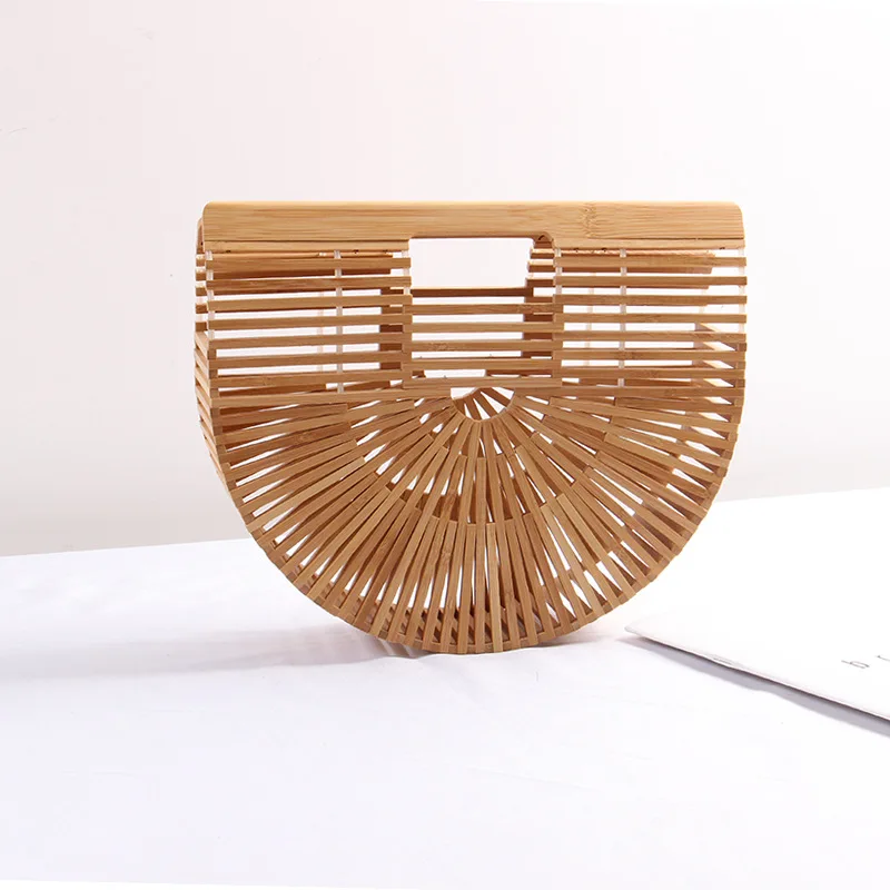 

Handmade rattan women's handbag 2019 new ins simple semi-circular bamboo weaving portable travel holiday beach bag straw bag