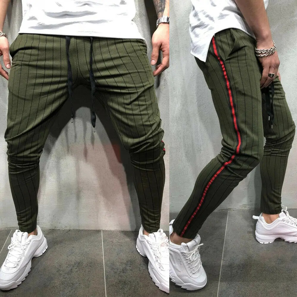 black joggers with green stripe