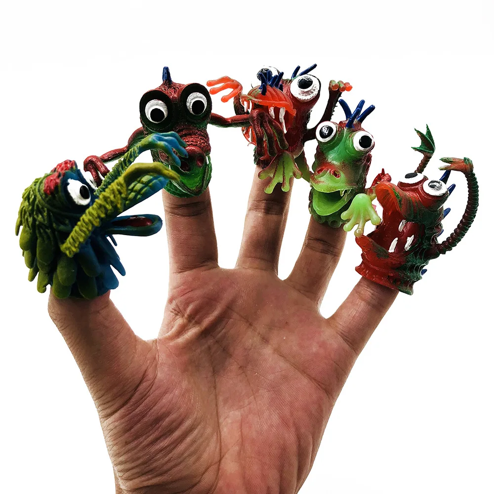 

A set of 5 PVC super cute magic props simulate monster finger gloves, facial expressions suitable for children's festival gifts