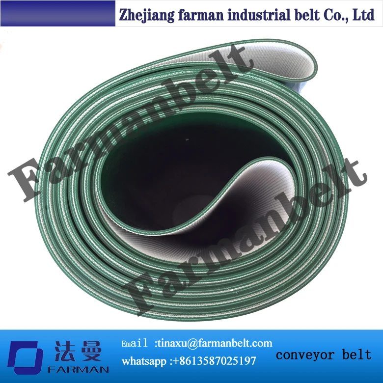 Green PVC conveyor belt in roll with flat top