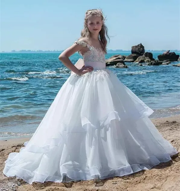 

2018 Customized Girls Pageant Gown Capped Sleeves Sheer Neck A Line Organza Lace Applique Beads Long Flower Girls Dresses