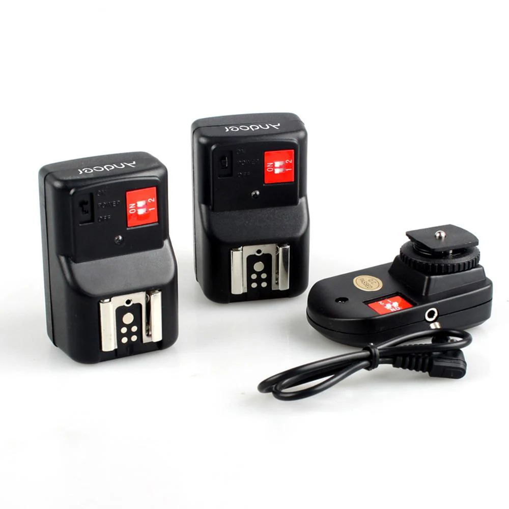 

Andoer PT-04GY 4 Channels Wireless Remote Speedlite Flash Trigger 1 Transmitter and 2 Receivers for Canon Nikon Pentax Olympus