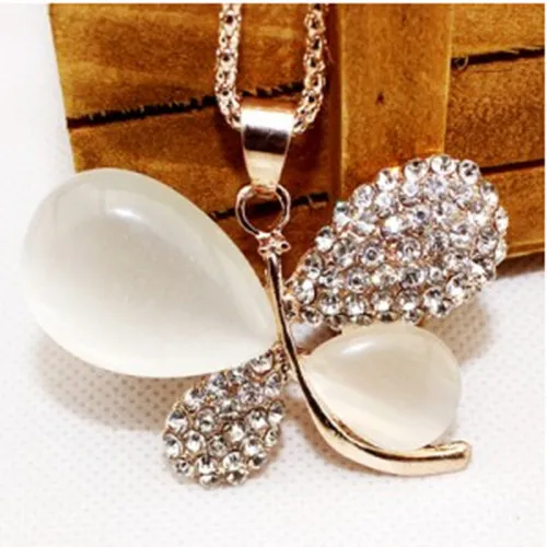 

Dress accessories fashion personality cat's eye stone Crystal alloy dragonfly Small goldfish Pendant female necklace sweater cha