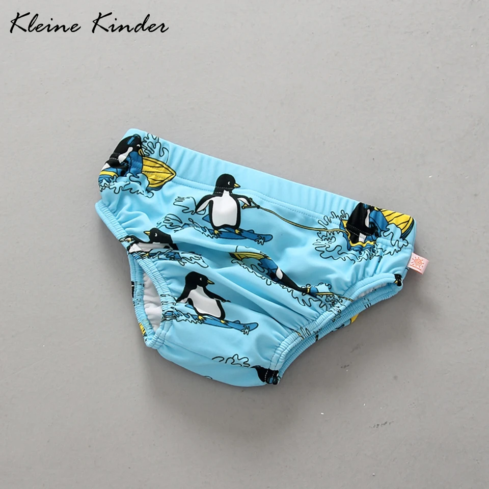 penguin print swim trunks