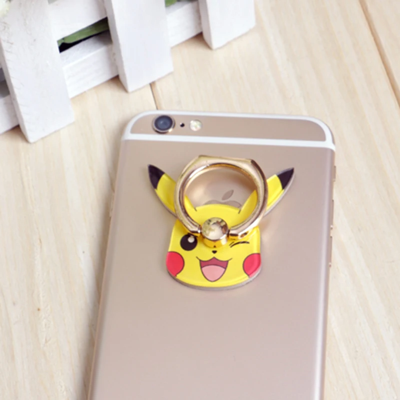 

New Pikachu Charmander Squirtle Psyduck Anti-fall Metal Finger Ring Mobile Phone Support action toy