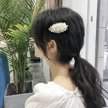 

Ins network celebrity pearl hairpin female Korean hairpin headgear clip girl hair clip back head spoon hair clip word clip