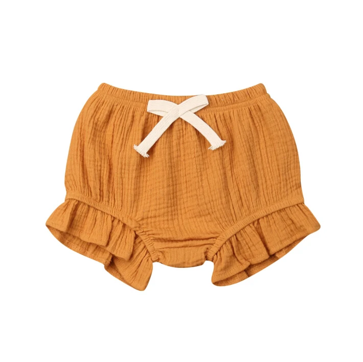 Стиль для маленьких девочек хлопковые шорты с бантиком, эластичная Пояс Штаны на подгузник для младенцев штаны-шаровары чистый цветной подгузник крышка Лидер продаж новорожденных шорты - Цвет: Цвет: желтый