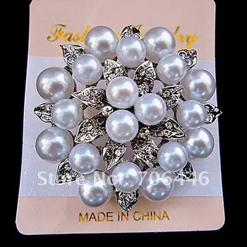 

Silver Plated Crystal and White Pearl Leaf Flower Brooch