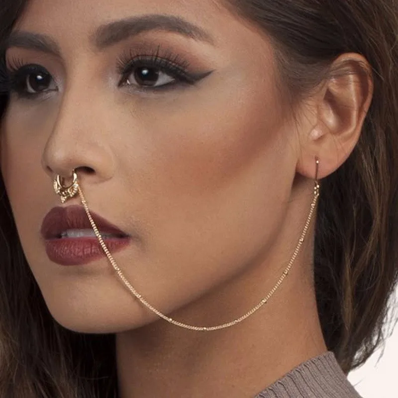 Кольцо в носу как называется. Серьги для пирсинга носа. Пирсинг носа кольцо сбоку. Септум пирсинг в носу 2020. Прокол носа кольцо септум.