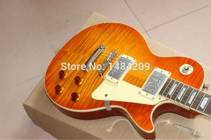 

Free shipping!customised electric guitar lp with AAAA grade tigerflame body top ,Chrome hardware parts,Cherry burst color!