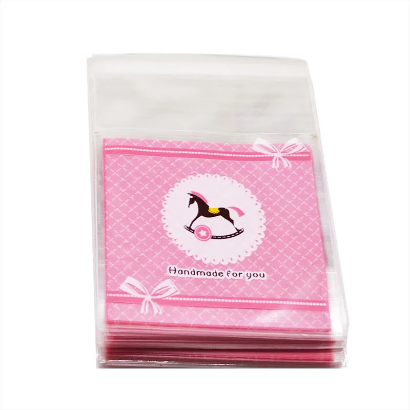 

50/100 pcs/lot Pink Trojan Cookie Candy Gift Bags Clear Self-adhesive Plastic Cellophane For Wedding Birthday Party Favors 8z