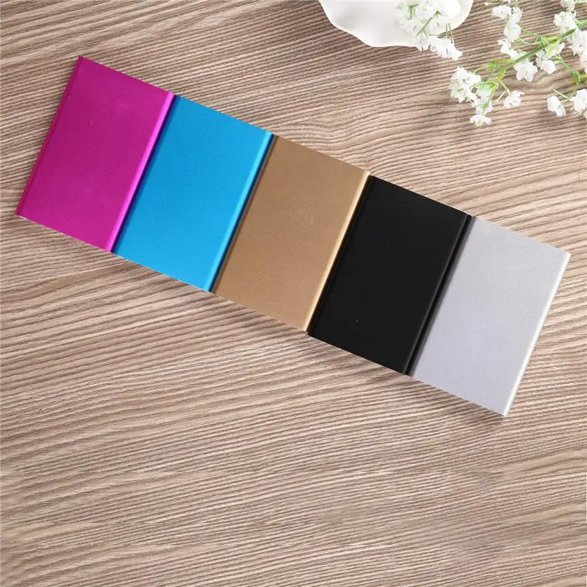 New arrival Ultrathin 12000 mAh Portable USB Battery Charger Power Bank For Iphone Smart Cell Phones Includes a charging cable